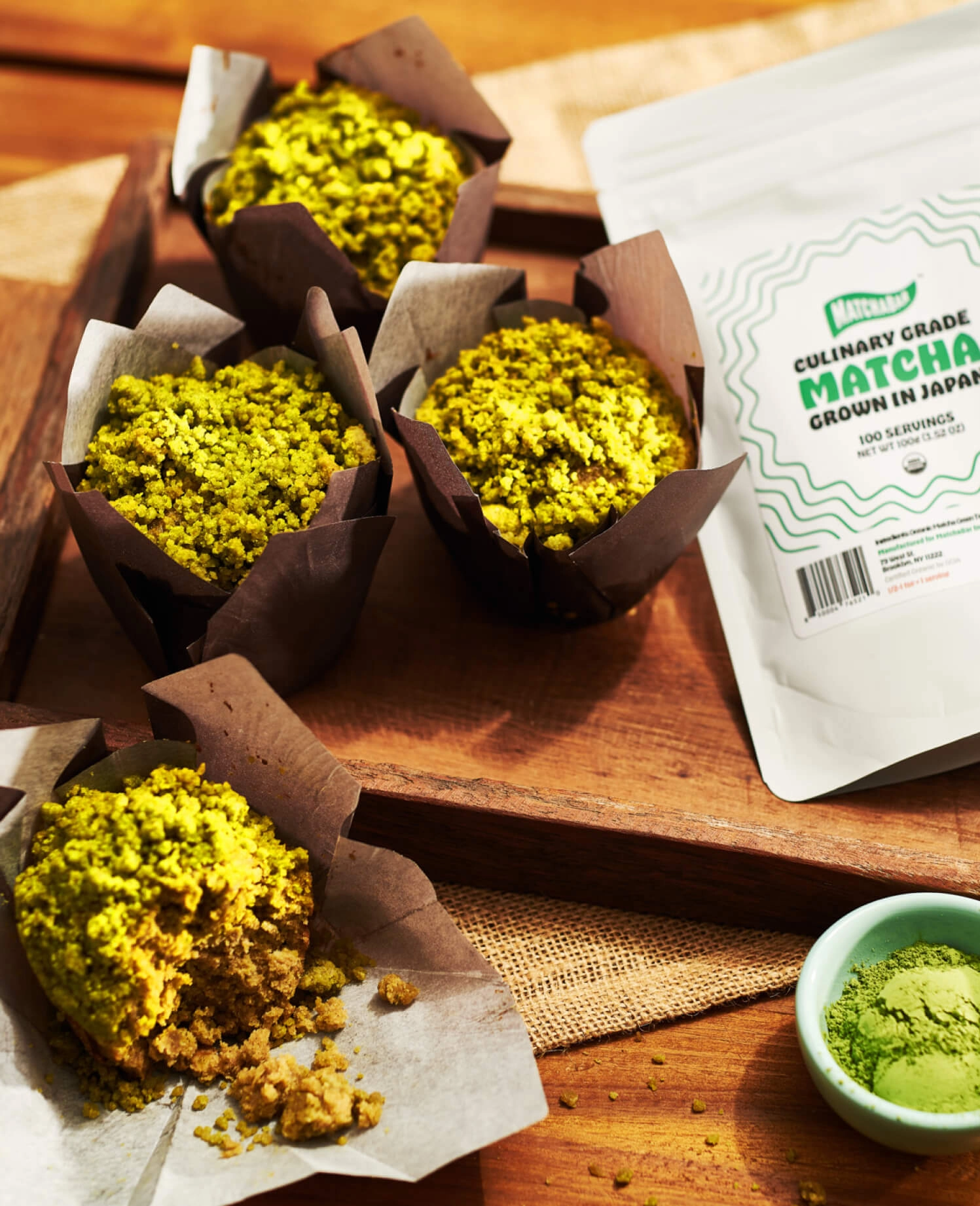 Matcha pastry and muffins on a tray